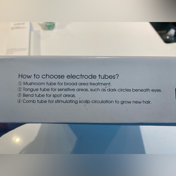 Brand new ant-acne ant-aging face device. Never used. With box and manual. - Picture 9 of 11